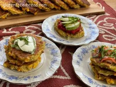 Recipe description:<br> Crispy and delicious, Vegan Corn Zucchini Fritters are made with grated zucchini and potato, corn, onions, and GF flour, formed into patties and pan fried until golden brown. When paired with <a href='/recipe-detail/sour-cream-and-garlic-dip/'>Sour Cream and Garlic Dip</a>, these are a scrumptious side dish. Or serve them alongside a nice fresh salad or soup for an excellent light lunch!